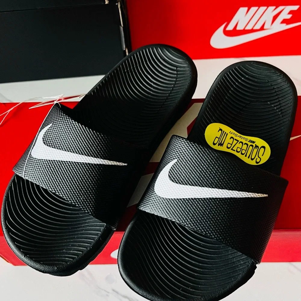 Nike Black and White Kawa Slides in Youth 1 Y